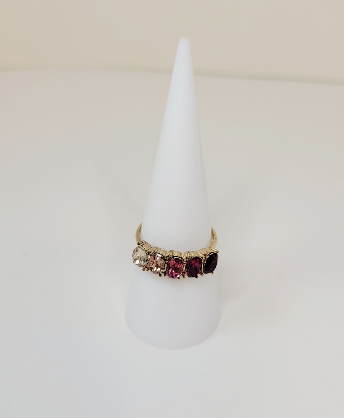 Rhinestone Pink Fade Ring. Size 8. Gold-toned band. Extendable. Pre-owned.