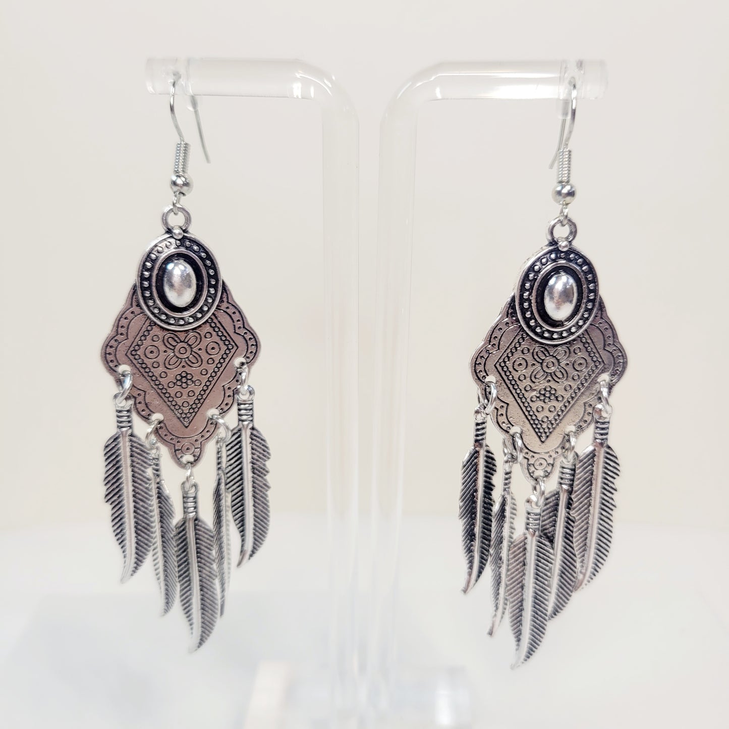 Bohemian Feather Drop Earrings. Silver tone.