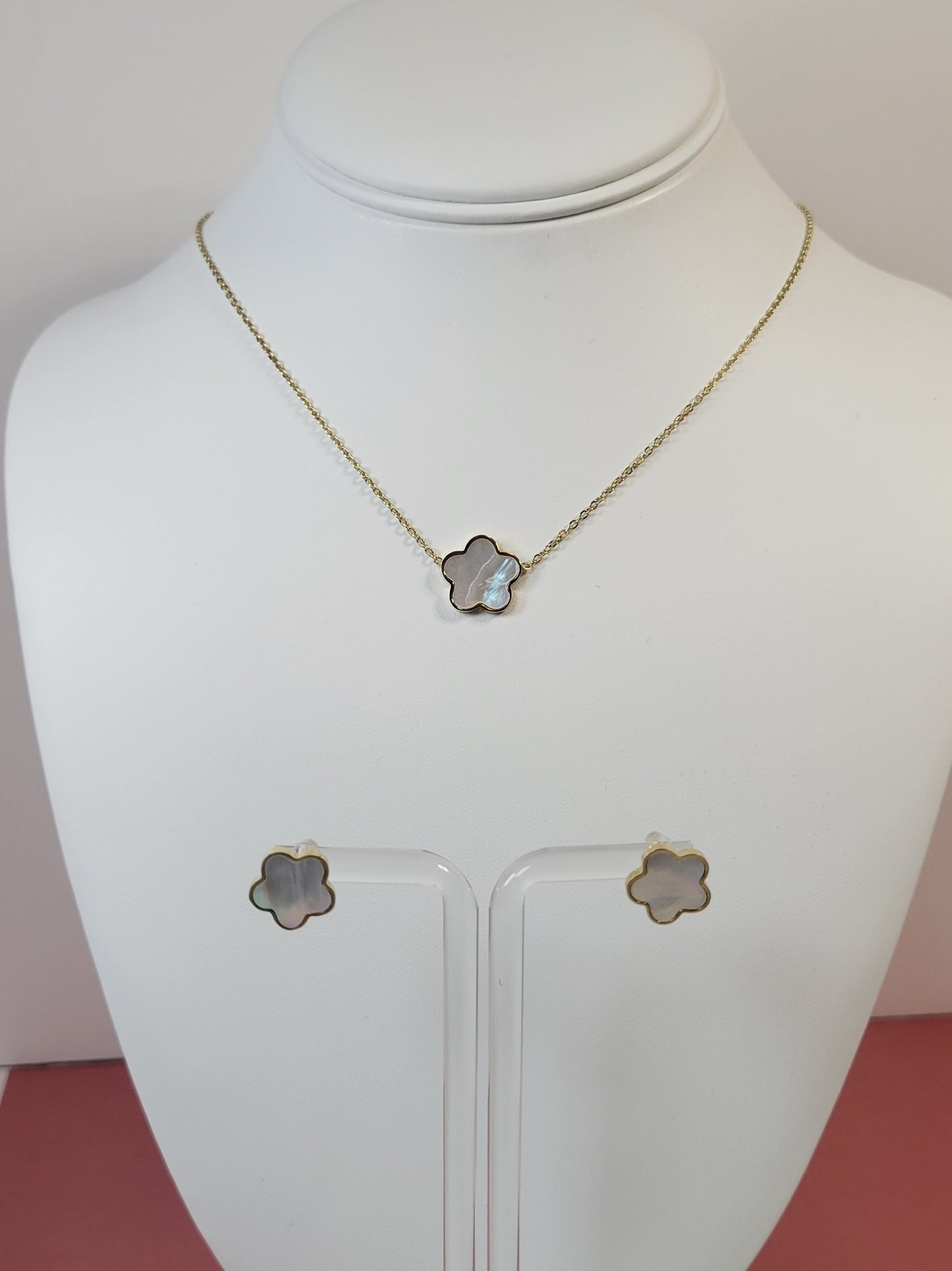 Star Twilight Necklace. Gold toned with shell inlay.