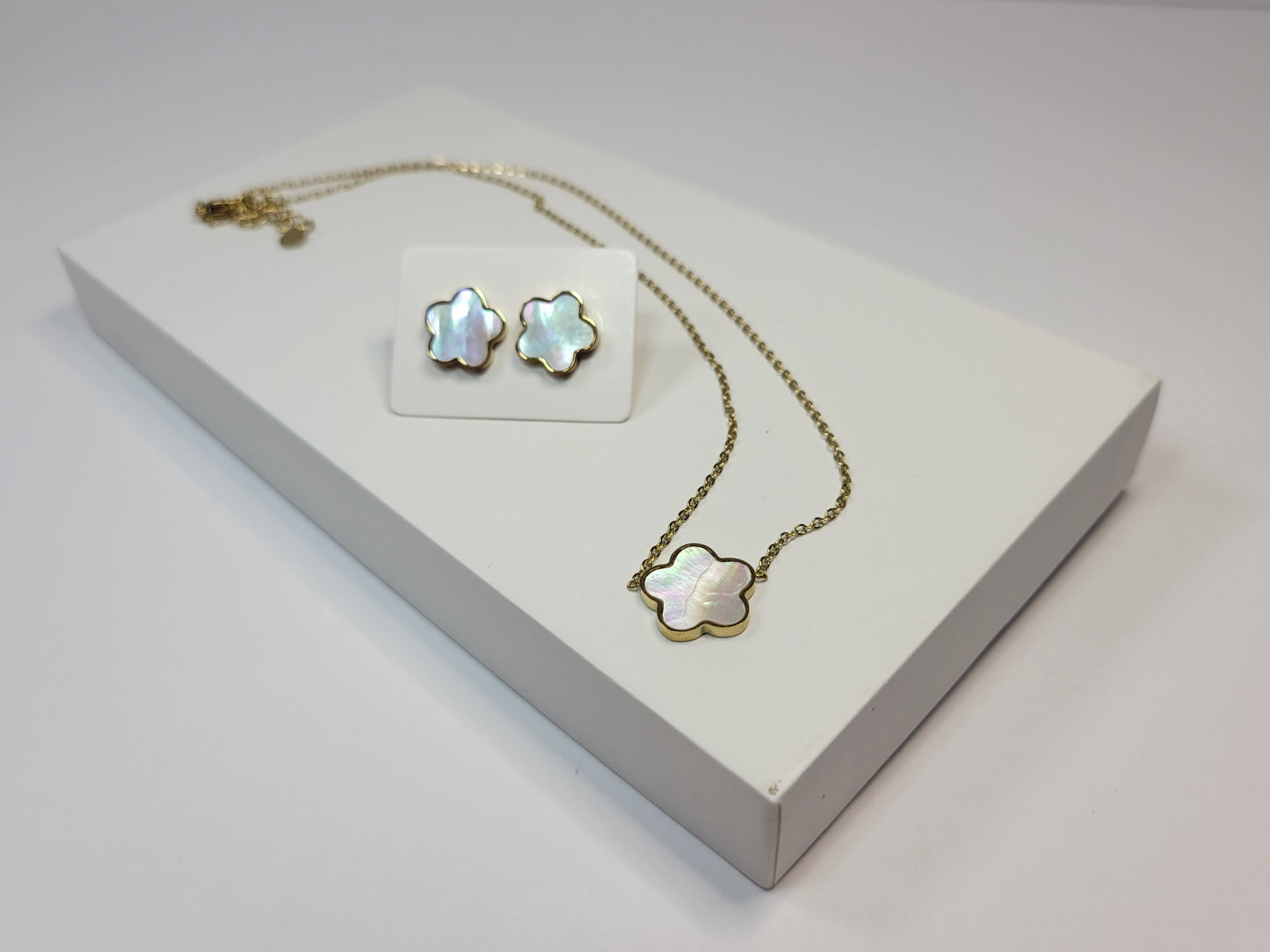 Star Twilight Necklace. Gold toned with shell inlay.